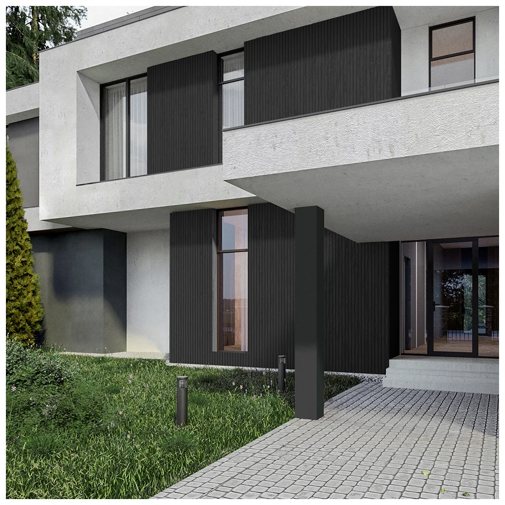 Elastický kompozitní obklad Line Graphite s drážkovaným povrchem na tmavé fasádě moderního domu
